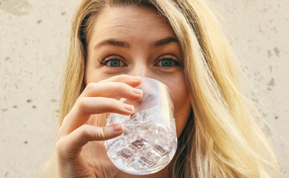 someone drink a glass of water as a remedy to smokers' cough